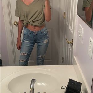 Distressed light wash jeans